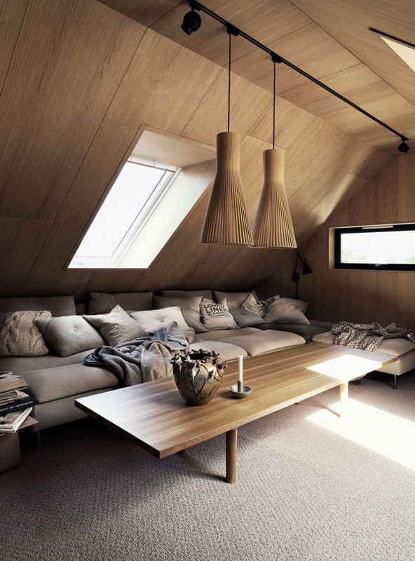 Стильный интерьер деревянного коттеджа в темных тонах в Швеции