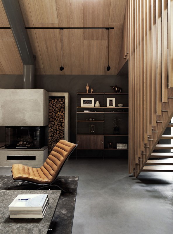 Стильный интерьер деревянного коттеджа в темных тонах в Швеции