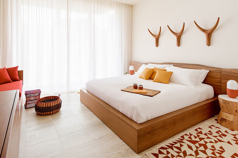 Оранжевое настроение: квартира с сочными акцентами и видом на океан в Мексике