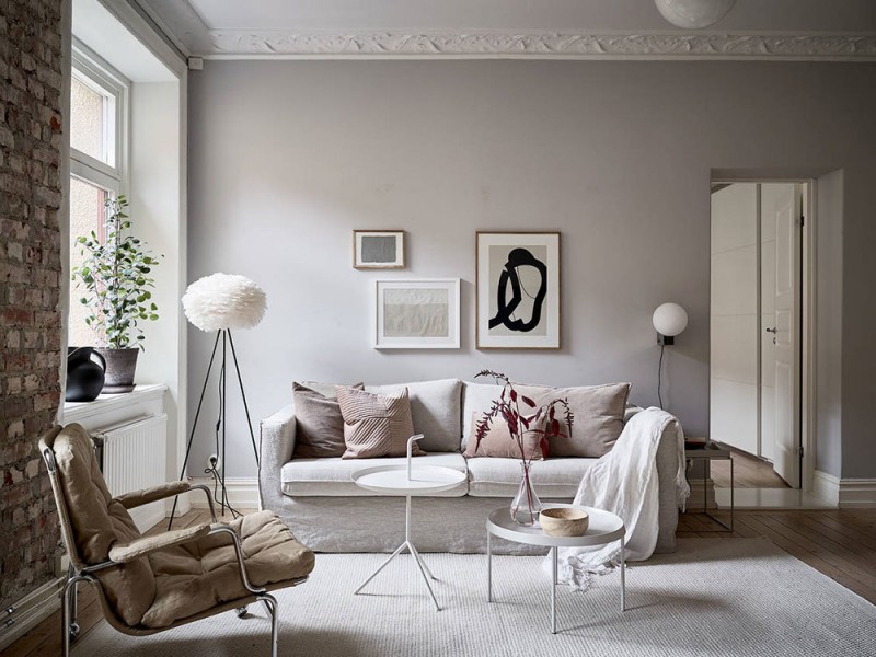 Нежный скандинавский интерьер с кирпичной стеной