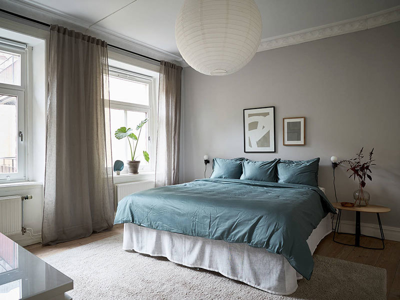 Нежный скандинавский интерьер с кирпичной стеной