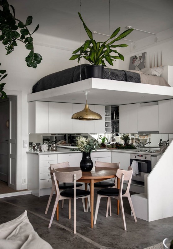 Домашняя библиотека и спальня в мезонине: небольшая промышленная квартира в Стокгольме (53 кв.м.) Домашняя библиотека и спальня в мезонине: небольшая промышленная квартира в Стокгольме (53 кв.м.)