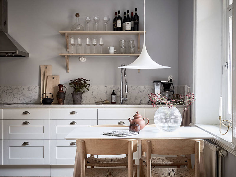 Нежный скандинавский интерьер с кирпичной стеной