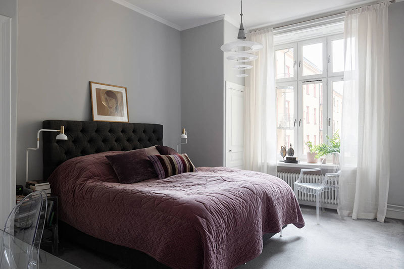 Оранжевый диван и огромные картины: красивая скандинавская квартира Оранжевый диван и огромные картины: красивая скандинавская квартира