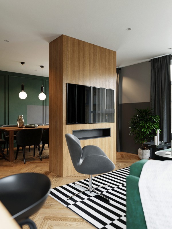 Акцент на зеленый и глубокий синий в интерьере квартиры, оформленной в спокойных серых тонах