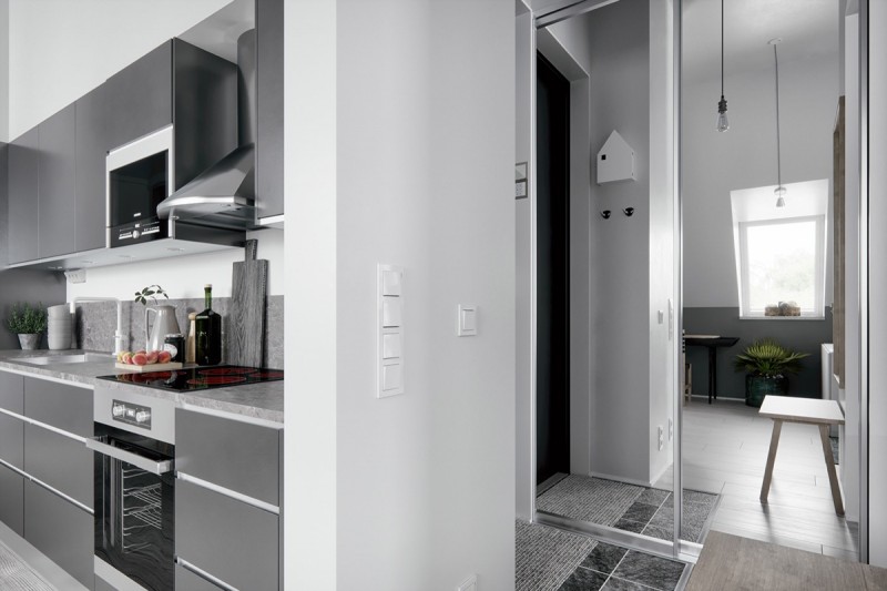 Интерьер мансарды в серых тонах Интерьер мансарды в серых тонах