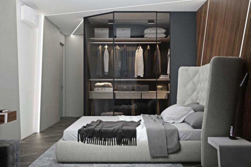 Использование черного, белого и цвета дерева в интерьере просторных минималистских апартаментов