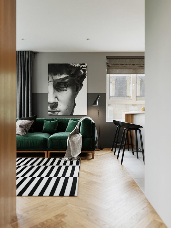 Акцент на зеленый и глубокий синий в интерьере квартиры, оформленной в спокойных серых тонах