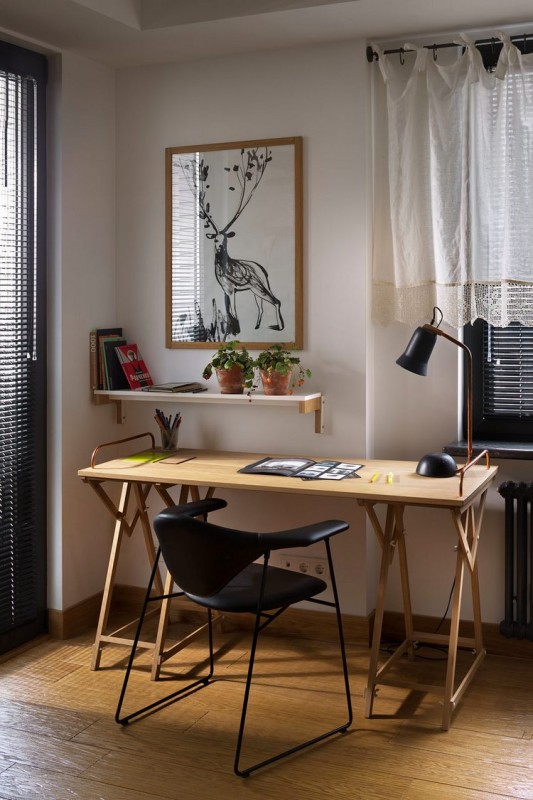 Контраст темных и светлых поверхностей в интерьере просторных апартаментов