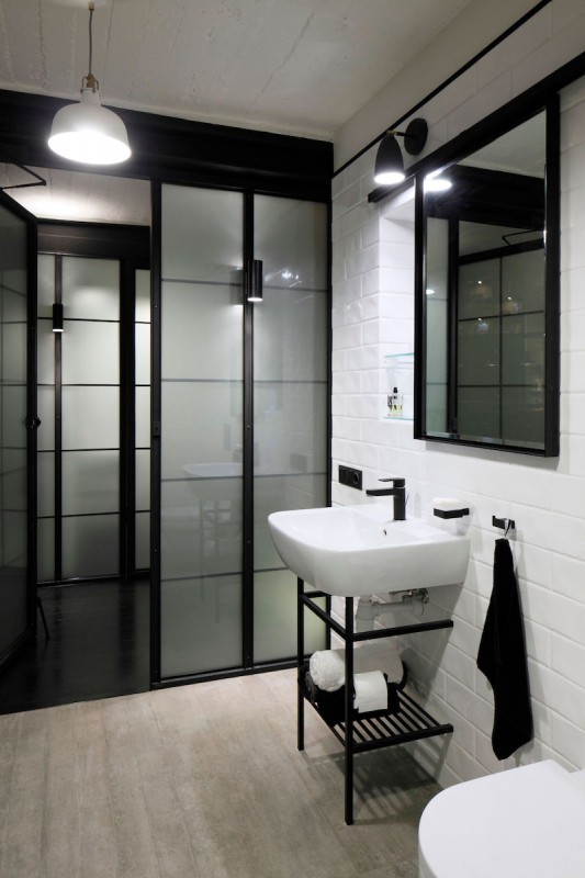 Сочетание индустриального и скандинавского стилей в интерьере уютной квартиры