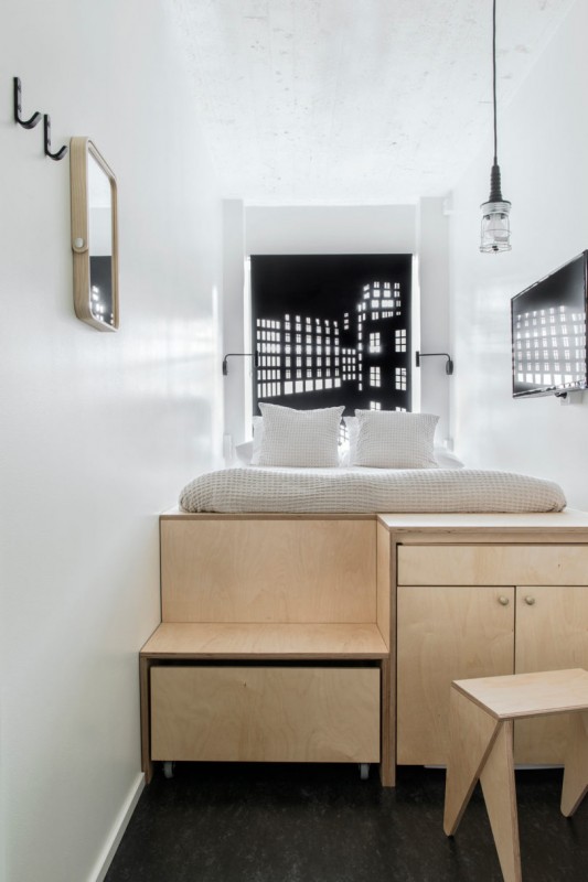 Бывший банк в Ювяскюля, Финляндия, был преобразован в современный хостел Studio Puisto Architects Бывший банк в Ювяскюля, Финляндия, был преобразован в современный хостел Studio Puisto Architects