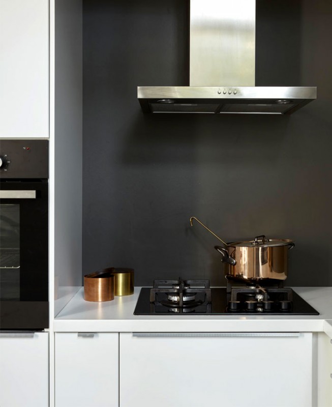 Уютная квартира с открытыми кирпичными стенами и арками