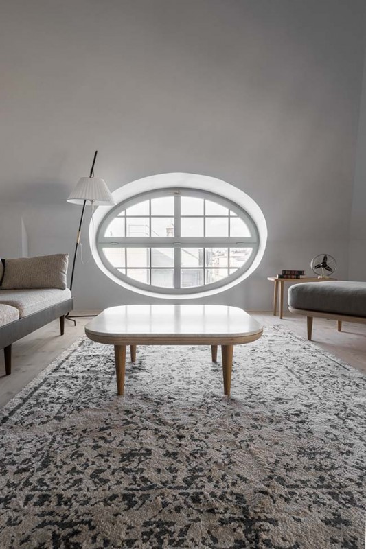 Квартира в мансарде многоквартирного дома 1911 года постройки в Кракове