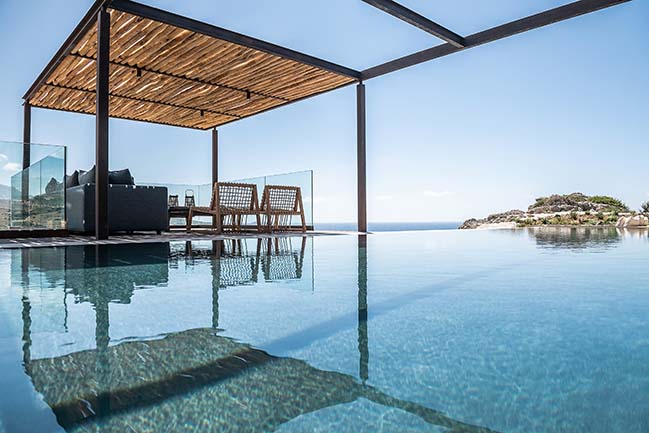 Вилла на Крите, интегрированная в дикий ландшафт и выполненная из камня и натуральных материалов