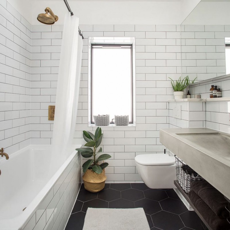 Акцентная стена черного цвета в оформлении небольшого дома