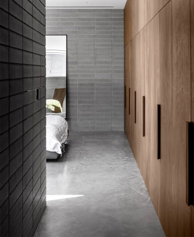 Серый камень и дерево в интерьере дома в Мельбурне, Австралия