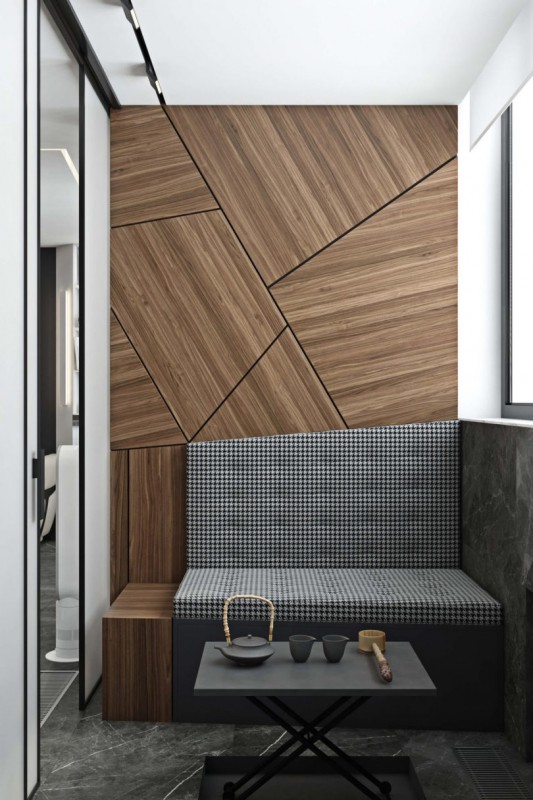 Использование черного, белого и цвета дерева в интерьере просторных минималистских апартаментов