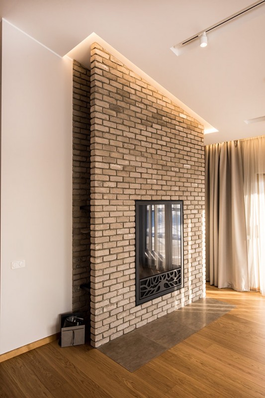 Гармоничный интерьер дома в Вильнюсе, оформленный в теплой цветовой гамме