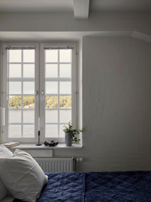Стокгольмская квартира с открытой планировкой и прекрасным камином площадью 108 м2