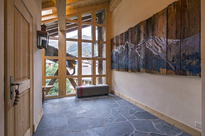 Двухуровневая квартира-пентхаус в комплексе Deux Rivieres на швейцарском курорте Вербье