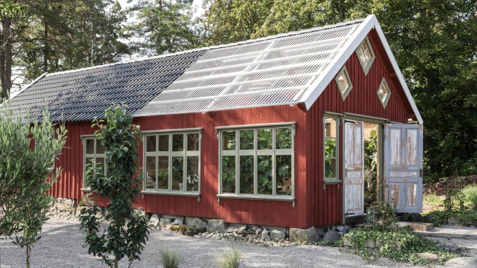 Сарай на участке загородного дома в Швеции, превращённый в зимний сад