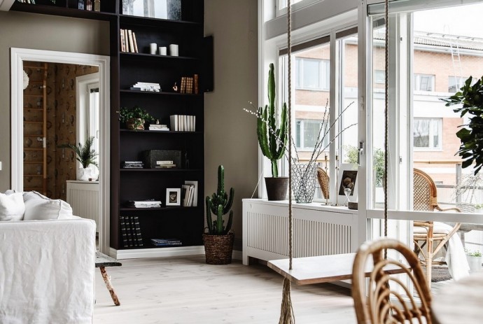 Интерьер шведской двухуровневой квартиры с винтажными деталями