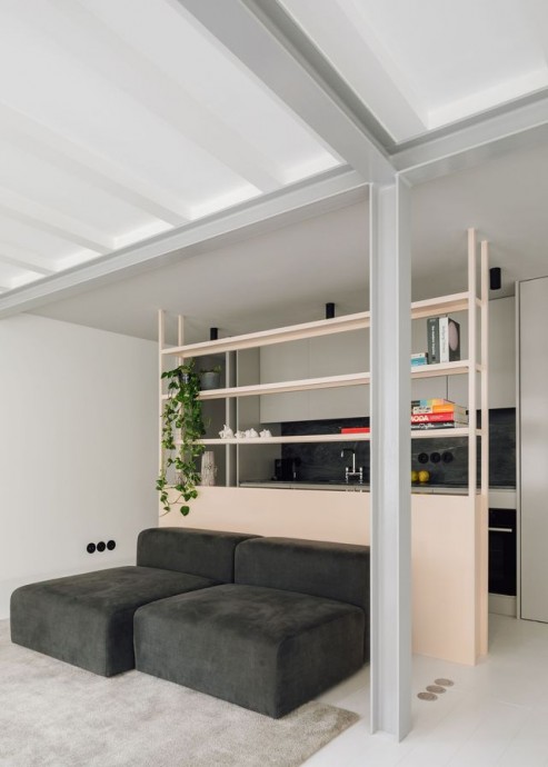 Минималистичная двухуровневая квартира площадью 60 м2 в Лиссабоне