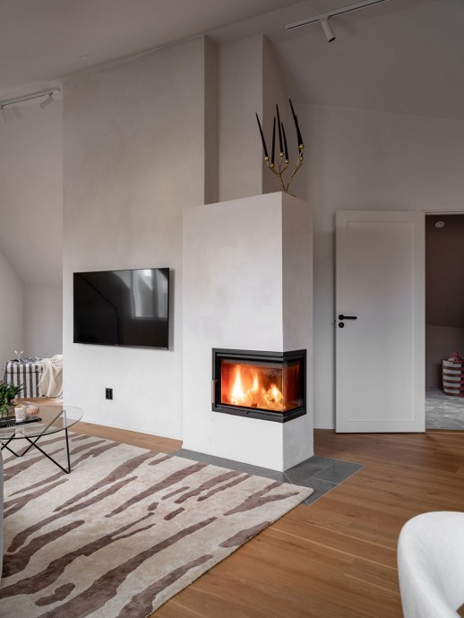 Стильная мансардная квартира под крышей старого дома в Стокгольме Стильная мансардная квартира под крышей старого дома в Стокгольме