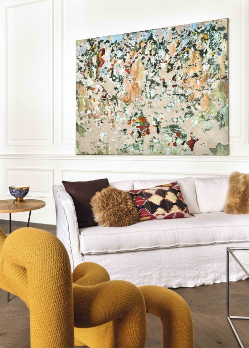 Дизайнерская мебель, мрамор и современные произведения искусства в интерьере мадридской квартиры