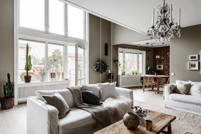 Интерьер шведской двухуровневой квартиры с винтажными деталями