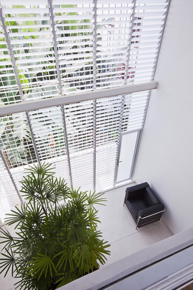 Светлый дом с живой растительностью в Хошимине Светлый дом с живой растительностью в Хошимине