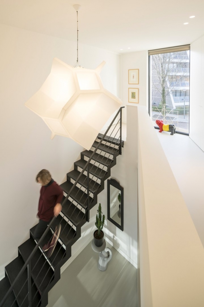 Дом с изогнутым фасадом в Роттердаме